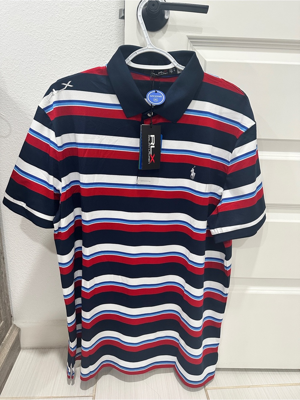 RLX Ralph Lauren Mens Size Large Polo Shirt French Navy Red Striped Pro Fit NWT